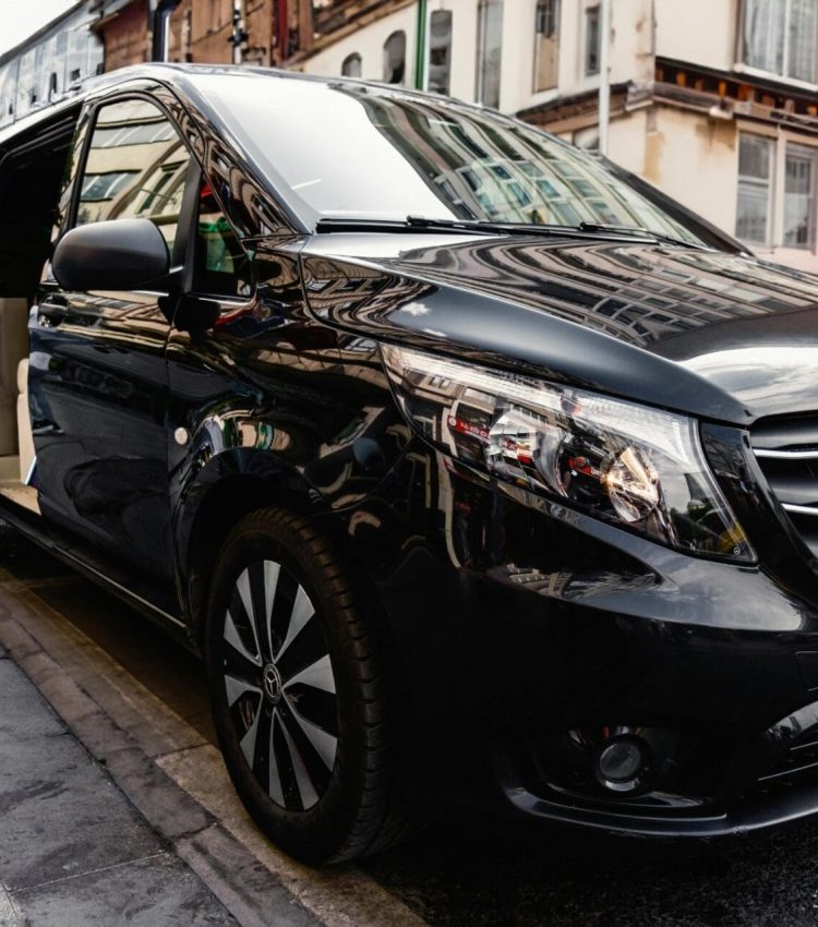 black car door to door service